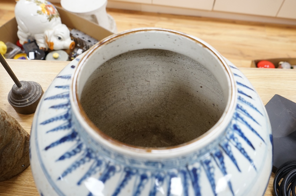 A large Chinese blue and white jar, 32cm high. Condition - some glazing faults